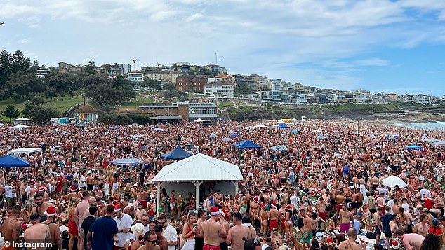 Nearly 10,000 people flocked to the beach park to celebrate the holiday festivities (photo)