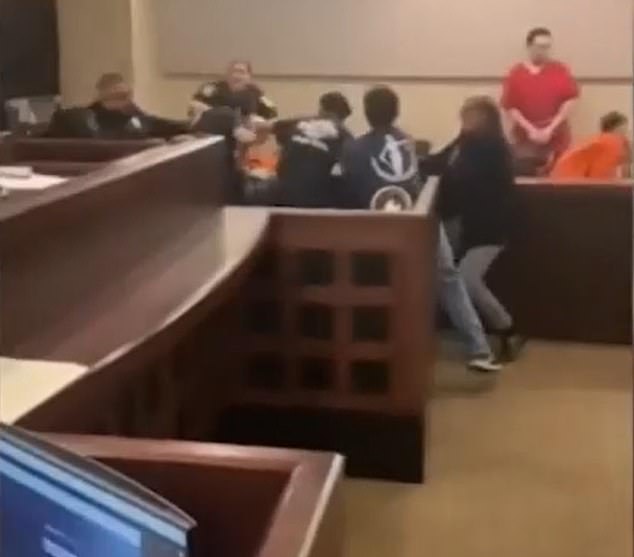 Victor Nathaneal Rivas, 18, was on trial Friday for the murder of Ethan Soto, 15, when the Soto family launched an attack, footage shows