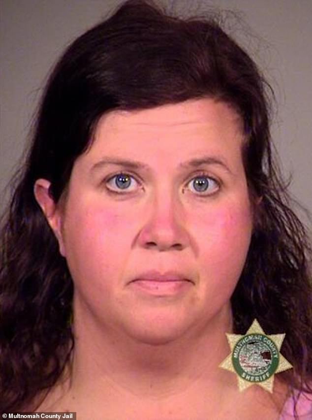 Zurcher-Wood is charged with animal abuse.  She pleaded not guilty last Friday and remains in custody at the Multnomah County Detention Center.  She is pictured in a 2021 mugshot