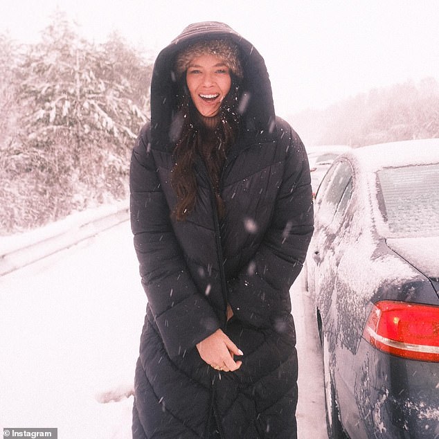 Brittany, ever the influencer, was later seen getting out of the car and braving the cold to pose for photos against the snowy backdrop