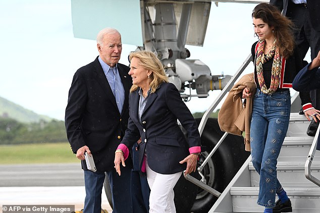 While Hunter remained in the United States, President Biden led members of the First Family, including First Lady Jill Biden and granddaughter Natalie (seen together) off Air Force One, as they vacationed on the Caribbean island of St Croix.