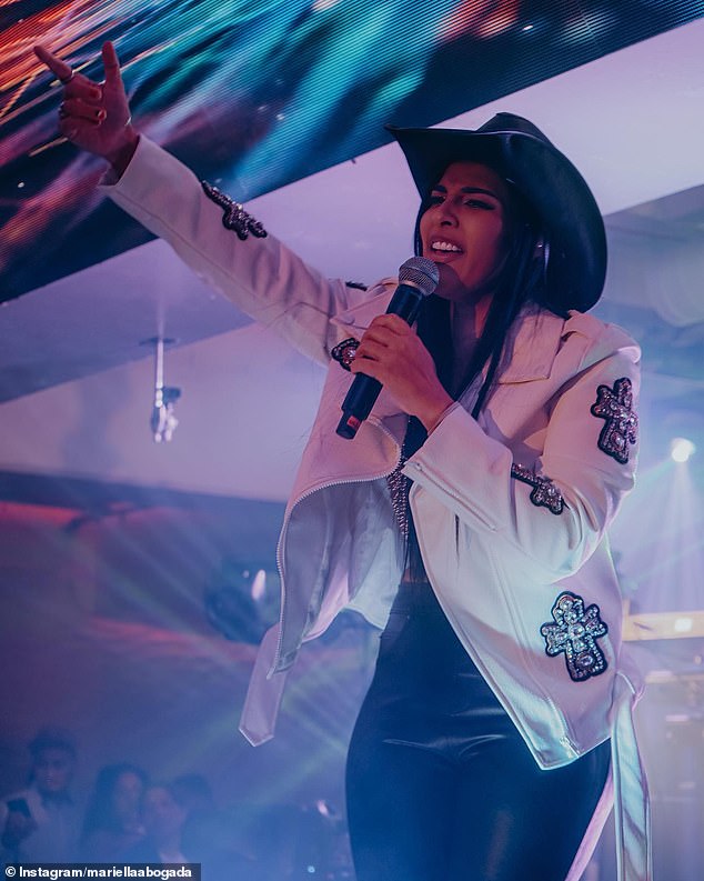 Mariel Colón, who was part of the defense team that represented Joaquín 'El Chapo' Guzmán and his wife Emma Coronel in a separate trial, performs at a show in Los Angeles to mark Mexican Independence Day