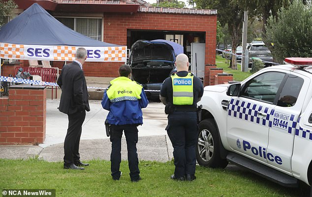 The Fawkner house where the first car was set on fire was the target of a late night shooting five days earlier.  Detectives are pictured at the scene on Thursday