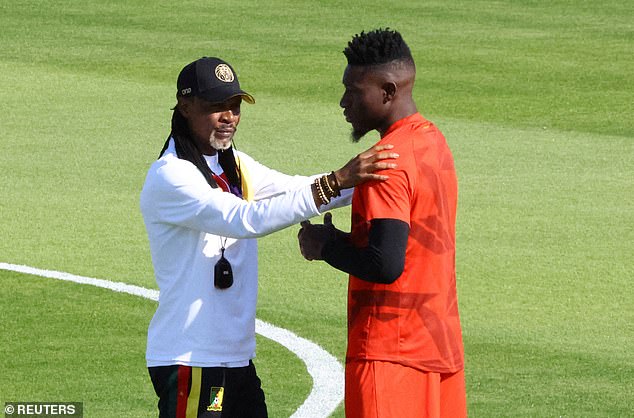 Onana was kicked out of the selection last year after an argument with coach Rigobert Song (left)