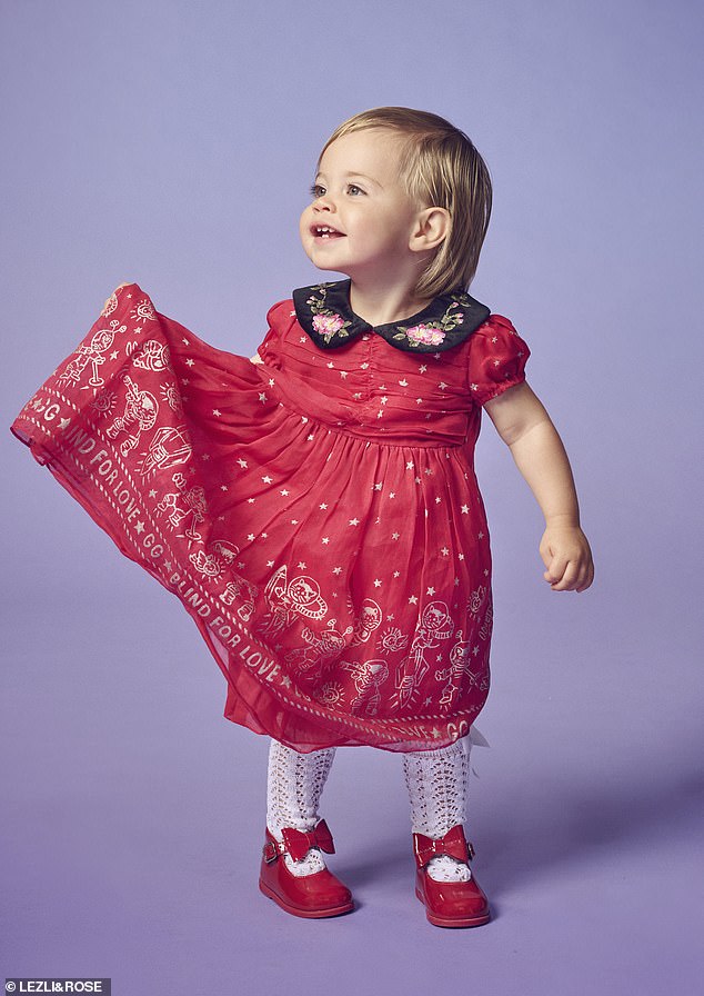 Baby model Maisie Jane Barker wears a Gucci dress, which costs £1,000