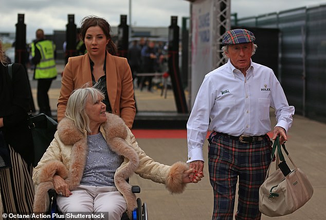 Sir Jackie, originally from Milton, Dunbartonshire, has described the disease's effect on families as 'appalling' (pictured with Lady Helen in 2022)
