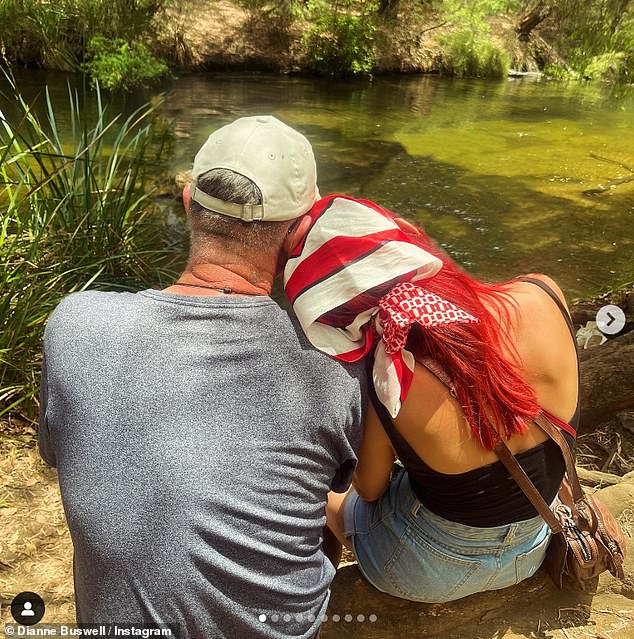 In another photo, Dianne wore a tank top and jeans as she cozy up with her dad Mark in front of a picturesque lake