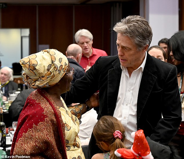 A council spokesperson said: 'Thank you to everyone who joined us at the annual Big H&F Christmas Day Lunch – including a very special guest, Hugh Grant.'