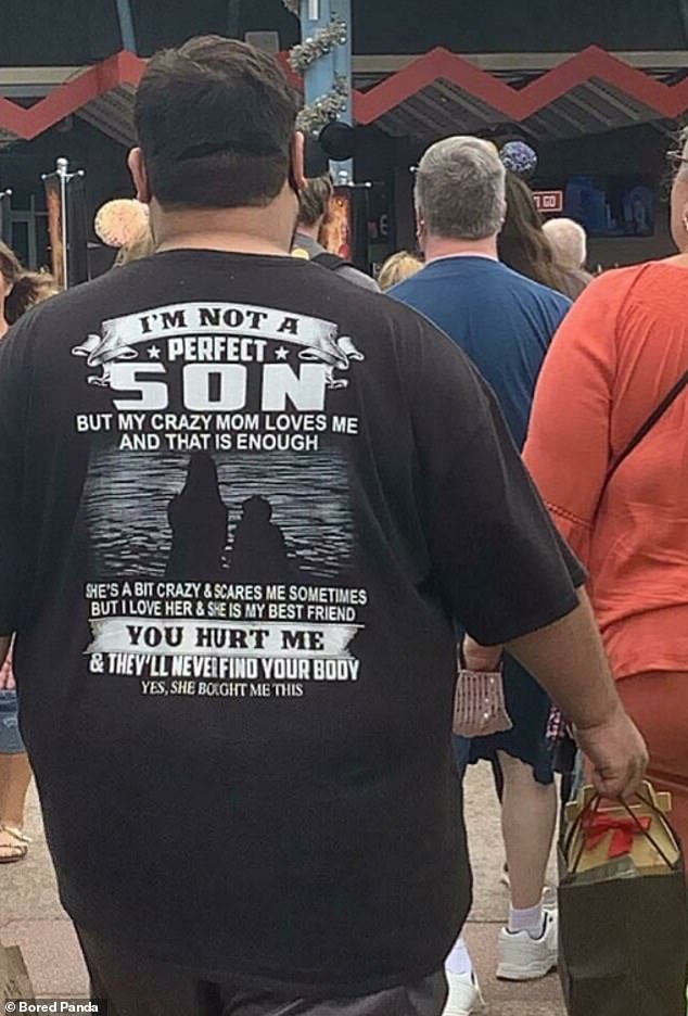 Fashionable family!  A man enjoying his day at Disneyland in Florida proudly carried a very unique gift from his mother