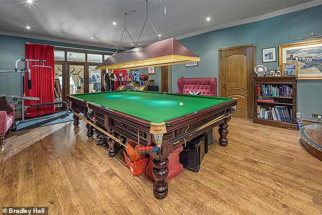 There is a snooker room which is spacious enough to also house a bar and some fitness equipment
