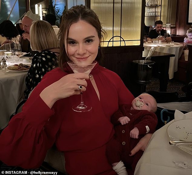 The aspiring actress took her own turn with Jesse, cradling him in one arm and holding a cocktail in the other