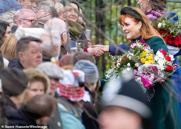 Sarah Ferguson greets well-wishers as she attends the Christmas morning service at Sandringham on December 25, 2023