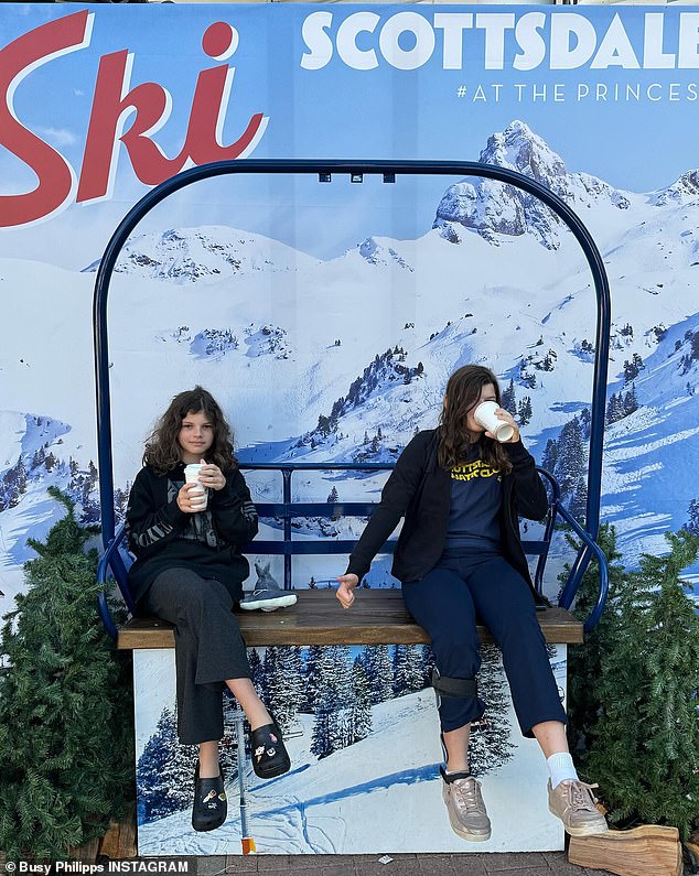 She also shared a photo of Cricket and her cousin drinking hot drinks while sitting on top of a ski lift for a photo shoot