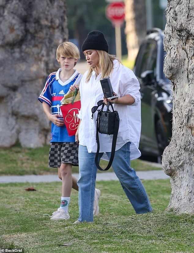 She was seen everywhere with her firstborn child, 11-year-old son Luca, whom she shares with ex-husband Mike Comrie