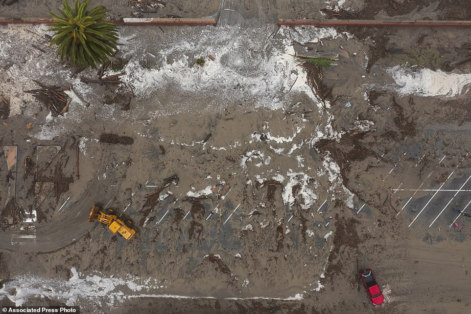 Storm debris in Aptos' Rio Del Mar neighborhood Thursday after storm-driven waves caused flooding