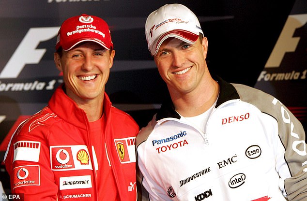 Ralf Schumacher (right) has hinted that his older brother Michael (left) may never fully recover