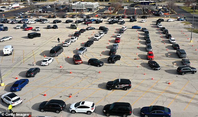 This is the photo our image is based on - showing 50 cars waiting in the parking lot next to CosMc's