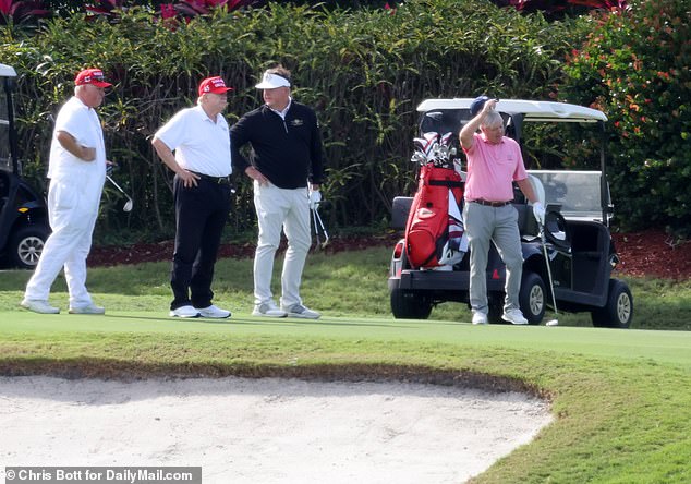 Republican Senator Lindsey Graham (far right in pink shirt) was one of Donald Trump's golf partners (second from left)