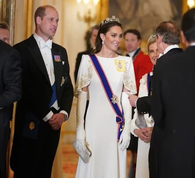 Another photo showed Kate looking glamorous at a state banquet