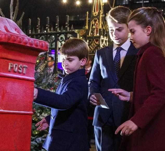 One photo showed the royal children posting letters during Kate's royal Christmas carol concert