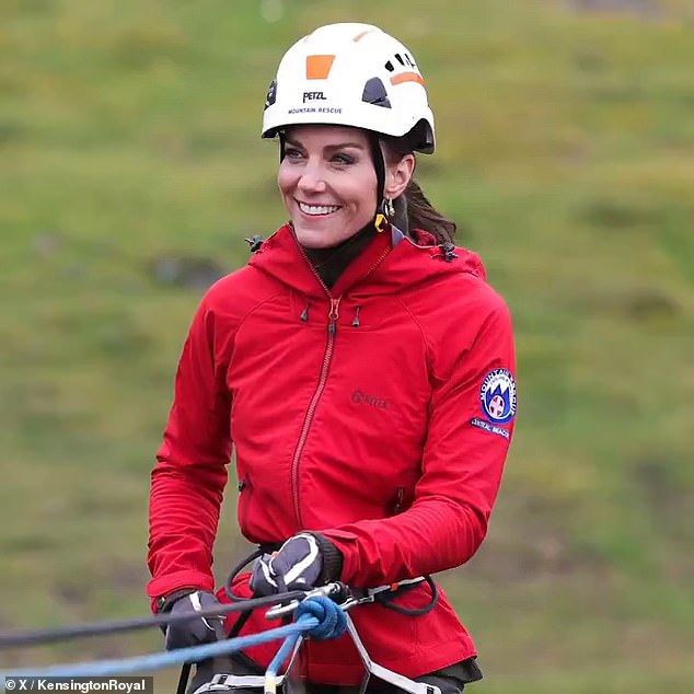 Kate, strapped down and wearing a helmet, visits the Central Beacons Mountain Rescue Team in Wales