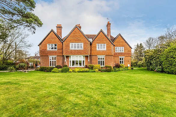 Dorking, Surrey: A three bedroom penthouse on the second floor of this property, set in communal grounds with a private driveway.  Savills.com, 01737 230202. £549,000