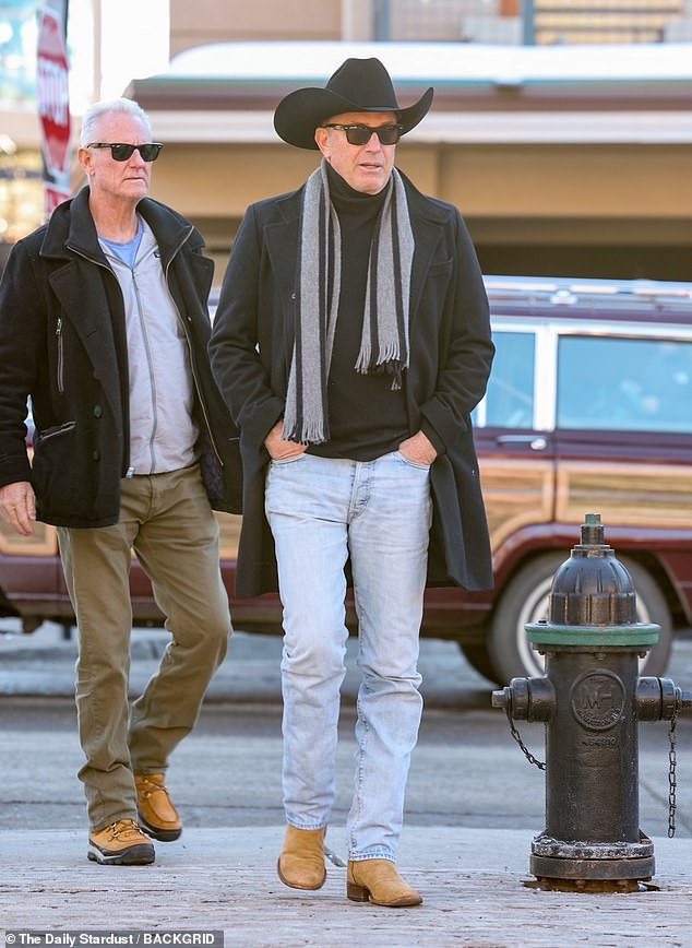 He also wore a black turtleneck and completed the ensemble with a pair of tan cowboy boots