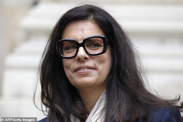 The 70-year-old's favorite accessories are large glasses with thick frames and a brightly colored scarf, which is usually worn with a practical pantsuit