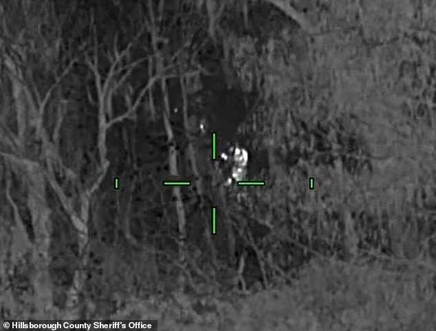 The couple's body heat helped illuminate them on the infrared cameras