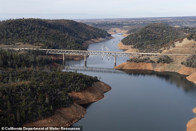 An aerial photo shows water conditions at the West Branch Feather River Bridge, located on Lake Oroville in Butte County, California.  At this date, water storage was 2,324,550 acre-feet (AF), 66 percent of total capacity.  Photo taken December 14, 2023. Andrew Nixon / California Department of Water Resources