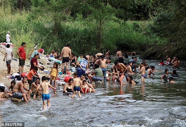 Large numbers of families with young children are in the caravan currently moving north through Mexico