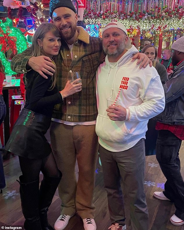 Travis Kelce's trainer, Andrew Spruill, is pictured with Travis Kelce and Taylor Swift