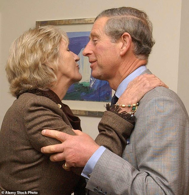 Annabel greets Prince Charles in Poundbury in November 2004