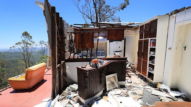 Some residents will take months, if not years, to rebuild after devastating storms (destroyed house in southeast Queensland pictured)