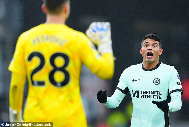 Silva speaks to goalkeeper Djordje Petrovic during Chelsea's match at Kenilworth Road