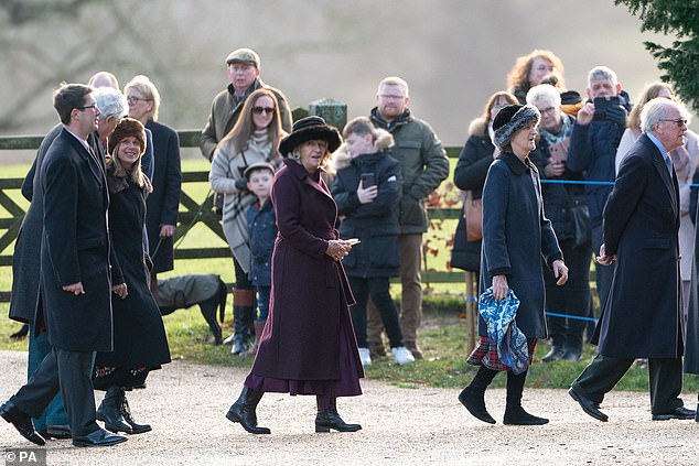 Guests arrive for the last Sunday service of the year at the Church of St. Mary Magdalene