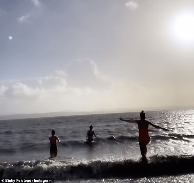 They were seen jumping over the waves before bravely immersing their bodies in the cold sea for a rejuvenating experience