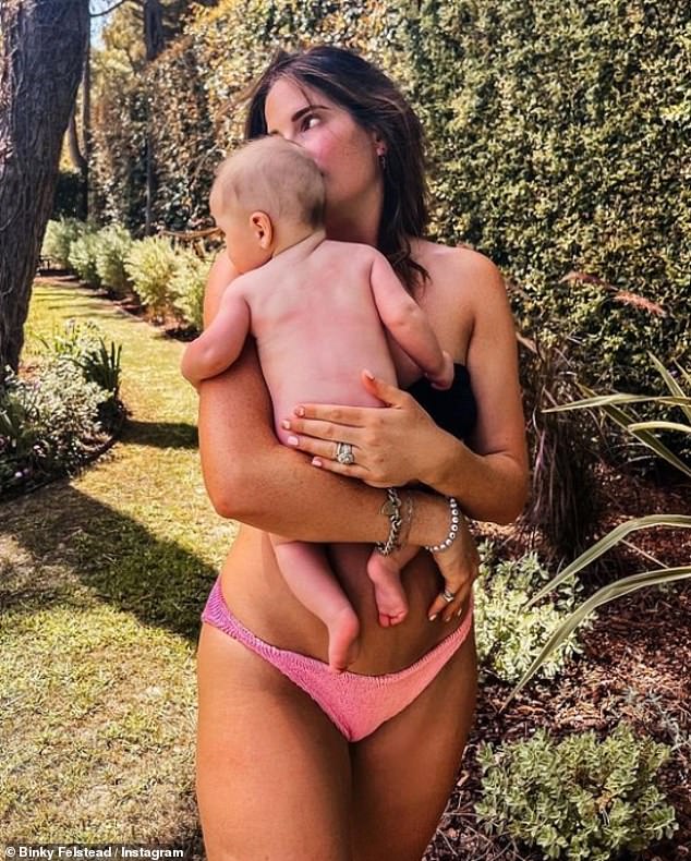 The mum-of-three, who welcomed her third child Wilder in April, admitted: 'I would never say I would never go under the knife - my friends who have done that look amazing!'