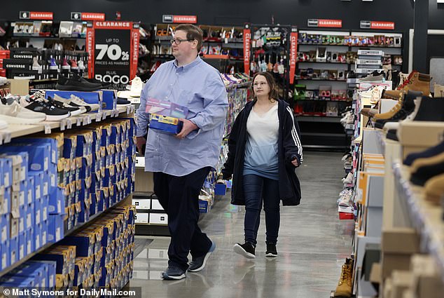 Blanchard remarried in prison to Lousiana's Ryan Anderson, seen here shoe shopping with the ex-con at a shoe store in Liberty, Missouri, Thursday after her release