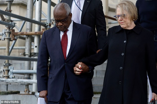 Supreme Court Justice Clarence Thomas (left) and his wife Ginni (right) leave Justice Sandra Day O'Connor's funeral service in Washington earlier this year