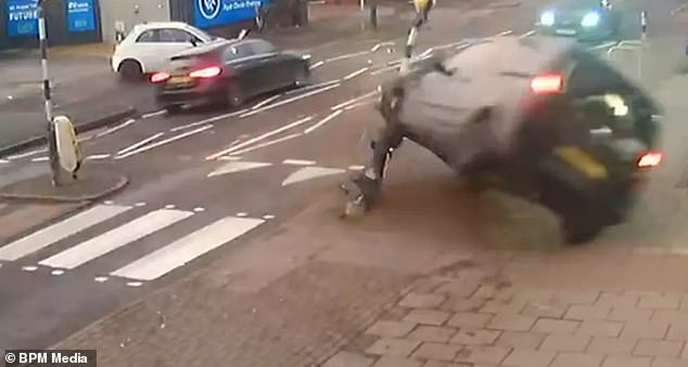 After crashing into the lamppost, the car flipped over in front of the mother and her toddler daughter