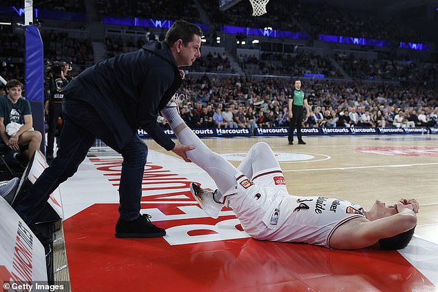 The quick-thinking fan rushed to help Vasiljevic with his leg cramp on Saturday evening