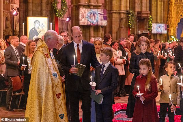 Prince William introduces Prince George to members of the clergy at Westminster Abbey in London