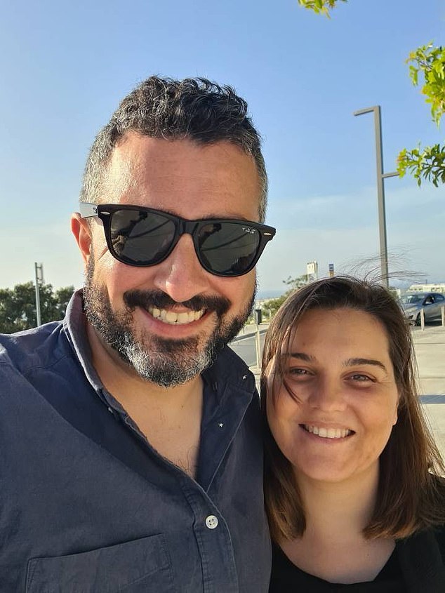 Father Mario Lucas (pictured with wife Serena), 40, found the words 'c*** stop checking in late' written in a pen on his seven-month-old son's bag as it went into the luggage hold