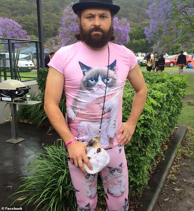 Andy Roberts (dressed in a festive cat-themed outfit) was arrested at his home in North Bondi, in Sydney's east, last week