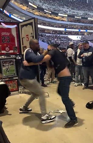 Rivals supporting the Cowboys and Eagles were filmed during Sunday's game