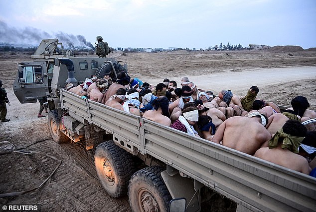 A military truck full of stripped and blindfolded Palestinians whom Israel has called 'terrorist suspects' without providing evidence