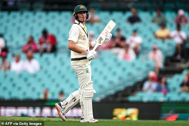 Sparse crowds begin to plague cricket in Australia, with Marnus Labuschagne pictured in front of empty seats against South Africa in January 2023