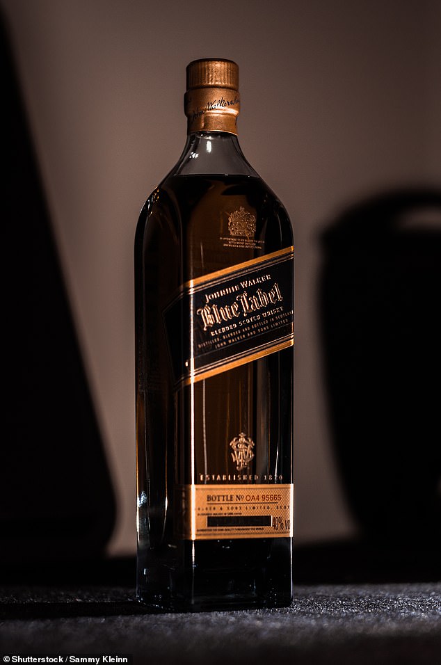 Aussies have shared the items they think are the biggest wastes of money as shoppers rush to buy last-minute Christmas presents (pictured, Johnnie Walker Blue Label)