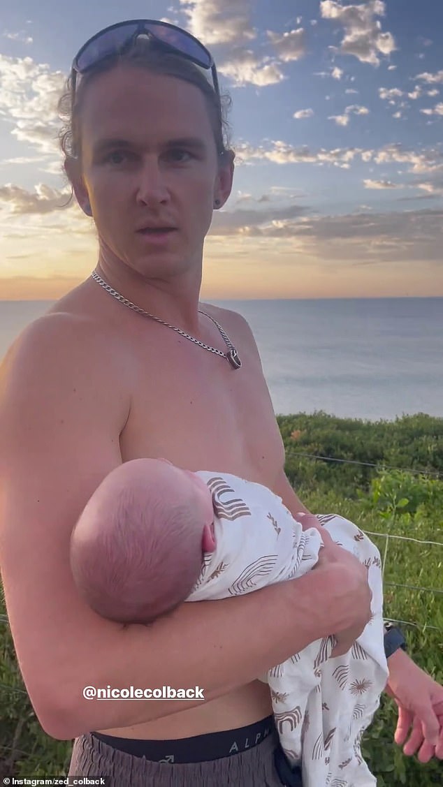 Australian Ninja Warrior star Zed Colback took his newborn daughter to the beach on Tuesday